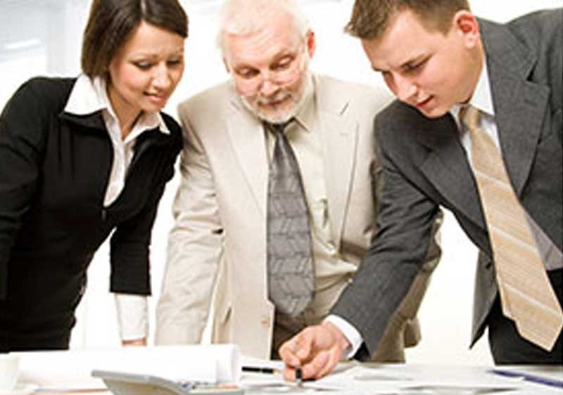 Businessmen presenting at the table