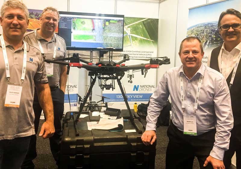 Four men with drones