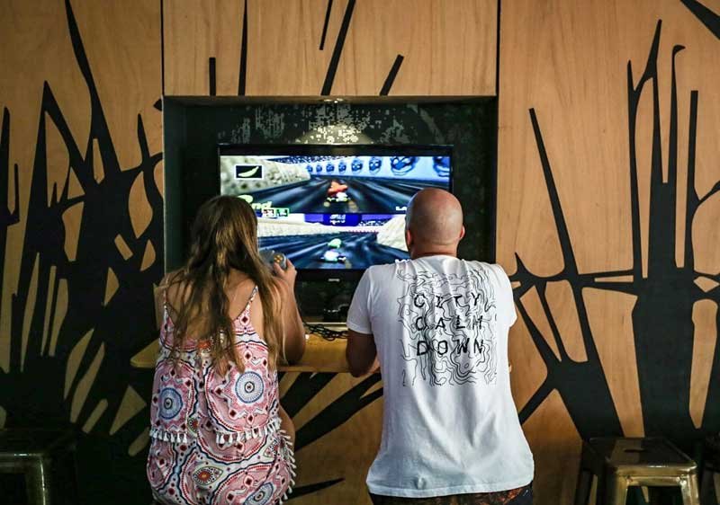 Man and woman playing video games