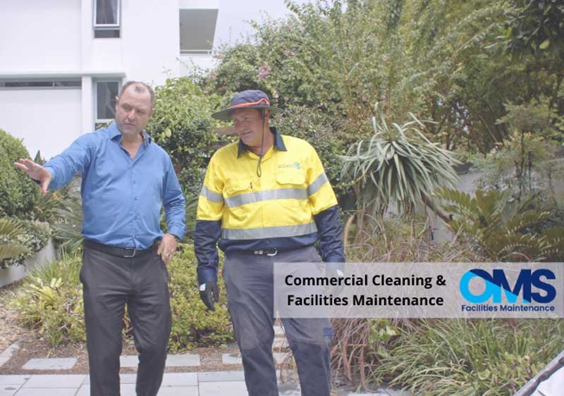Two men discussing maintenance.