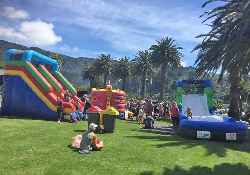 Park with multiple inflatable houses and slides