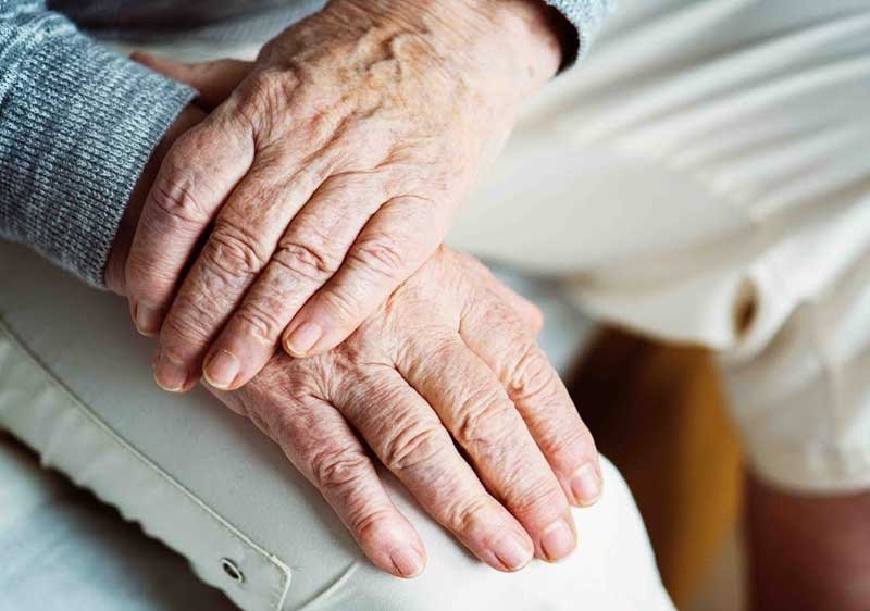 Hands of an elderly woman.